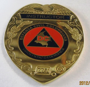 PLACA INSTRUCTOR, DEFENSA CIVIL COLOMBIANA, AMA JOYERIA CORPORATIVA